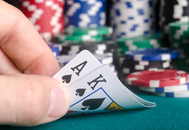 poker-hand-ace-and-king-of-spades-720x495